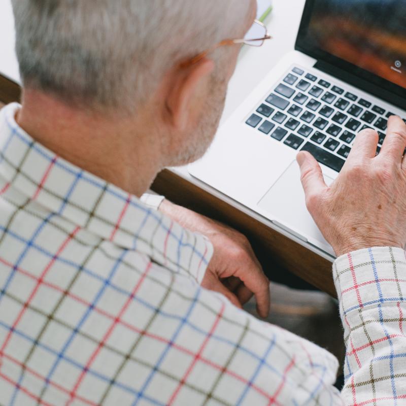 Older person using laptop
