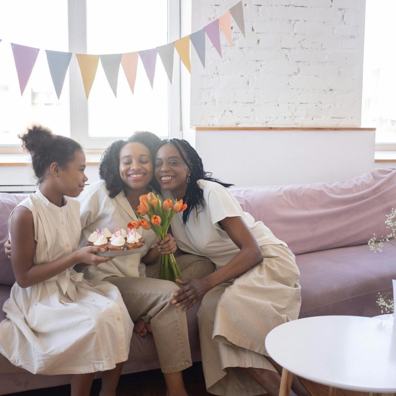 https://www.pexels.com/photo/happy-family-sitting-together-on-a-sofa-7358394/