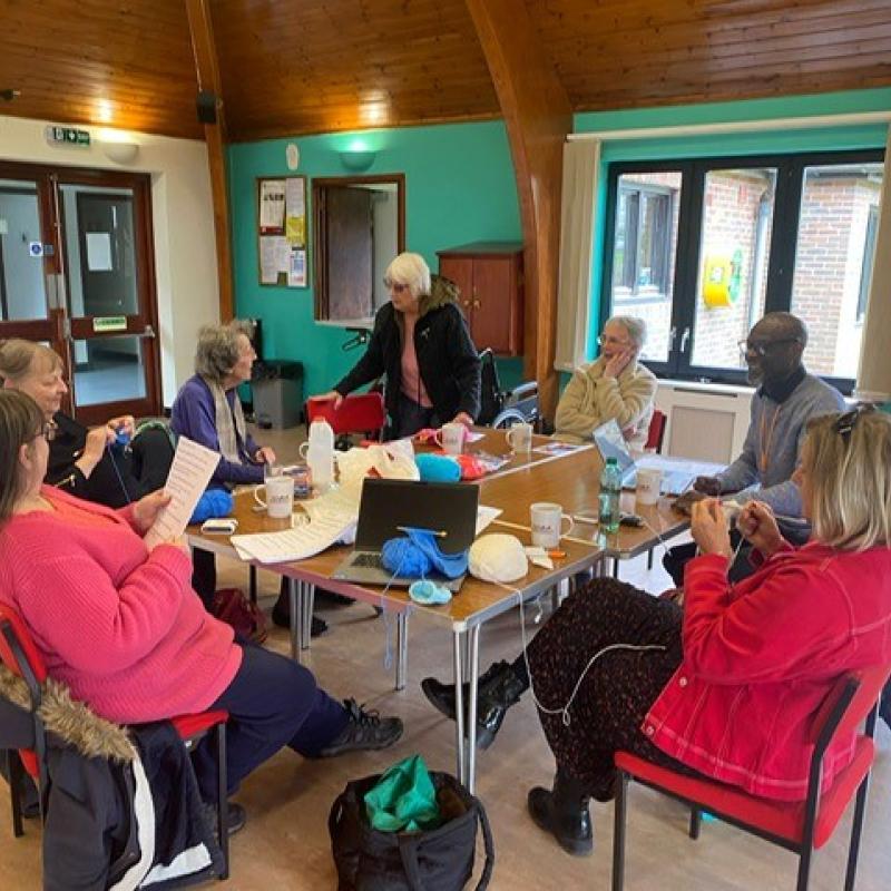 A group of people doing crafts.